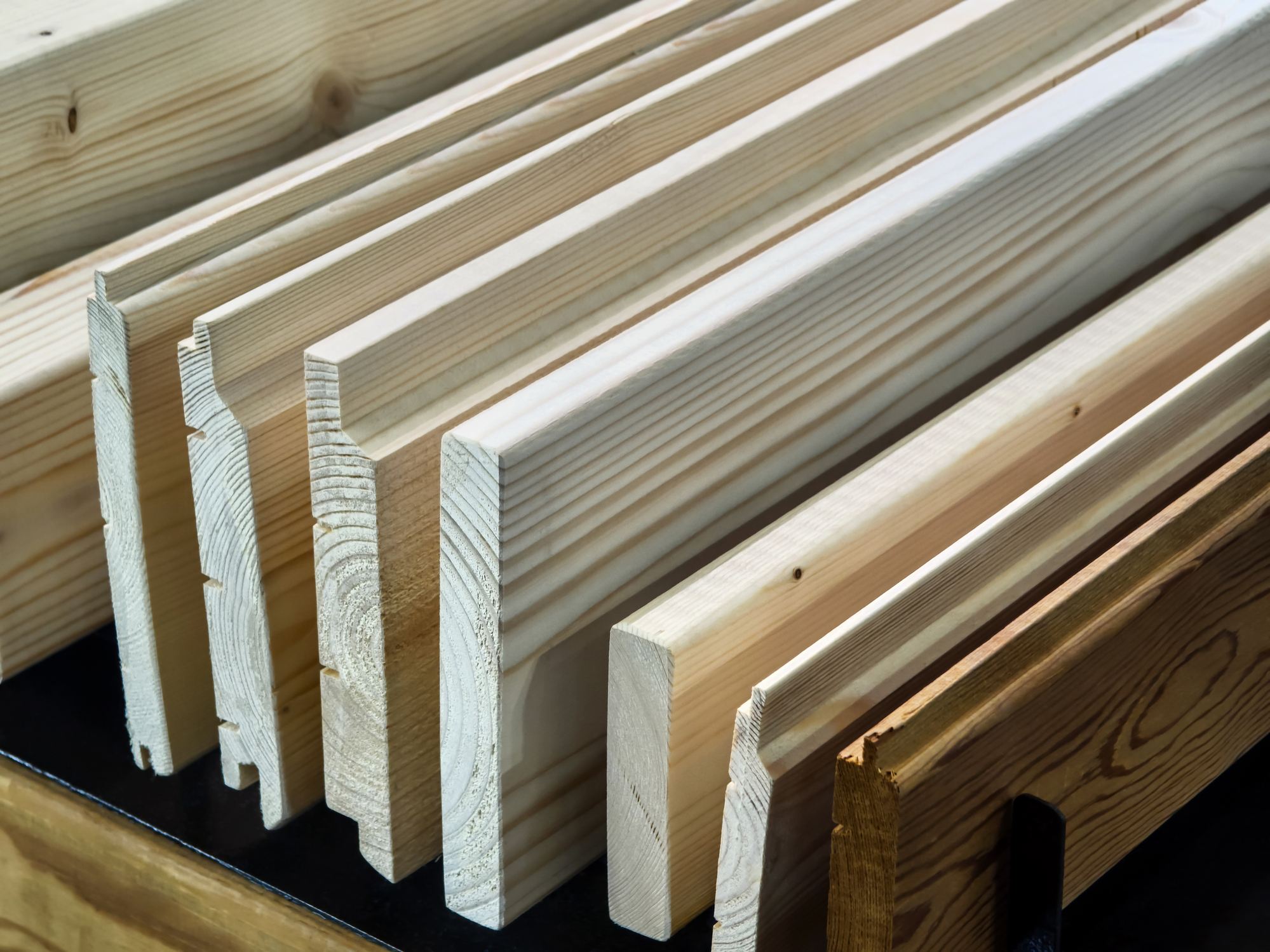 Stacked wooden planks in a workshop
